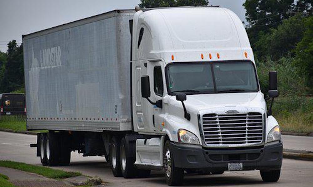 Commercial Truck driving on a road